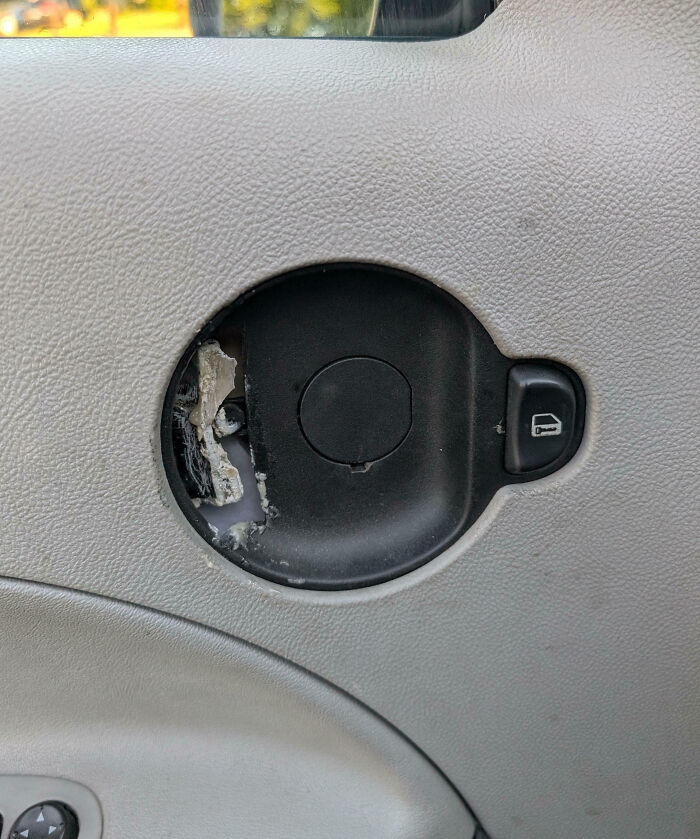 Car door lock handle missing cover with damaged interior, a common family frustration shared online.