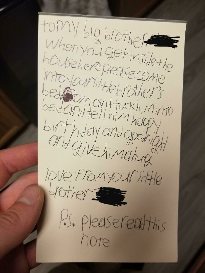 Handwritten note from a grateful little brother asking to tuck in his sibling and give hugs, showing sibling gratitude and love.
