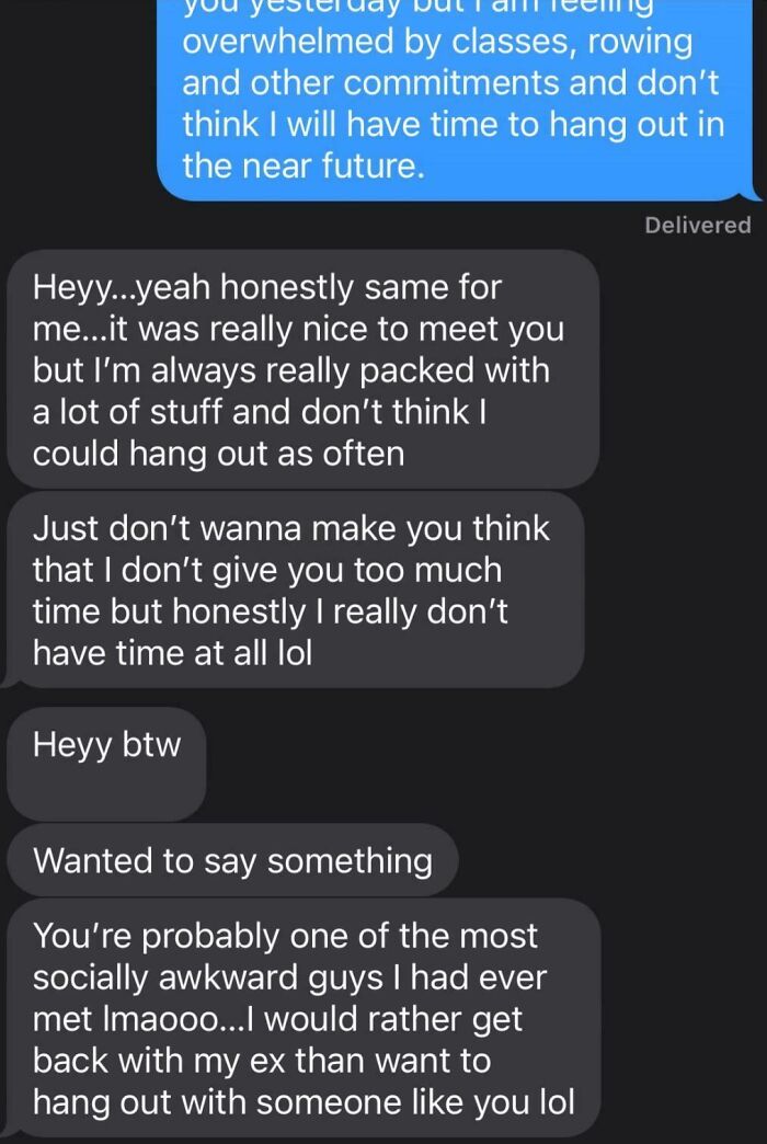 Text message exchange showing a woman calling out a man for being socially awkward and rejecting hanging out.