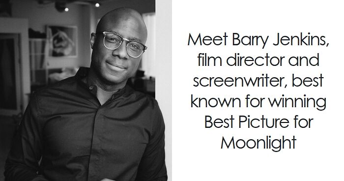 Barry Jenkins, film director and screenwriter, posing indoors with glasses, known for his influential bio and career highlights.
