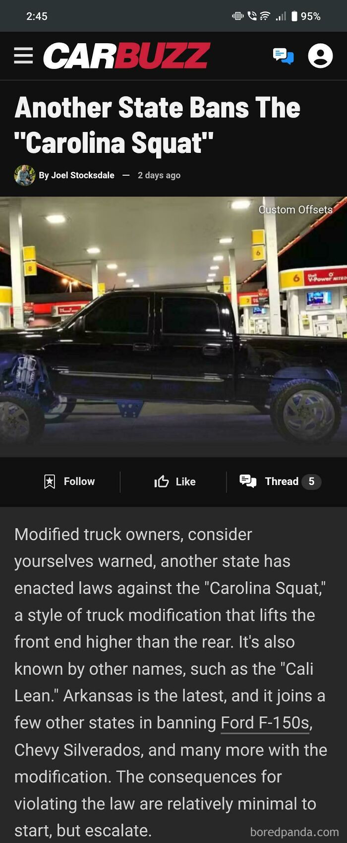 Modified truck lifted with front end higher than rear, an example of stupidity on wheels trying to make cars cooler.