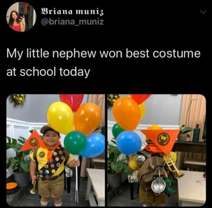 Child in creative costume with colorful balloons, celebrating wholesome internet moments that prove online world positivity.