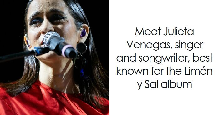 Julieta Venegas performing live on stage, wearing red, highlighting her bio and career highlights.