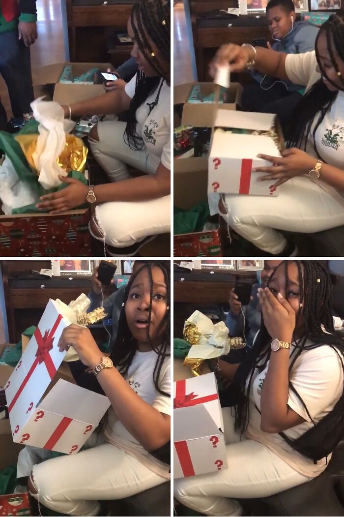 Young woman opening a surprise gift box from her sibling, showing joy and gratitude in a heartfelt moment.