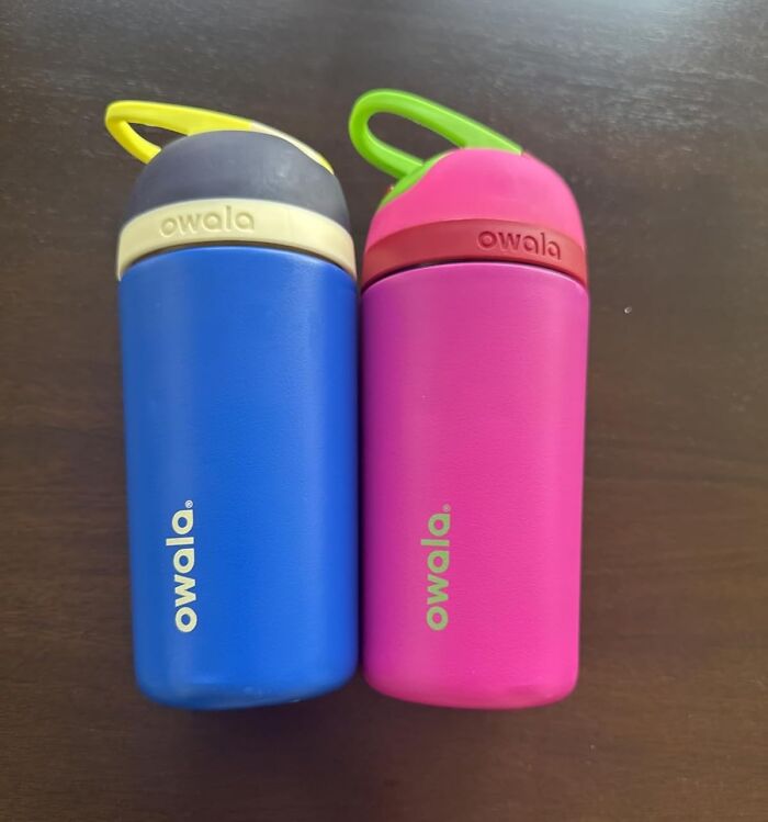 Two colorful Owala water bottles in blue and pink, ideal Black Friday stocking stuffer deals on gifts.