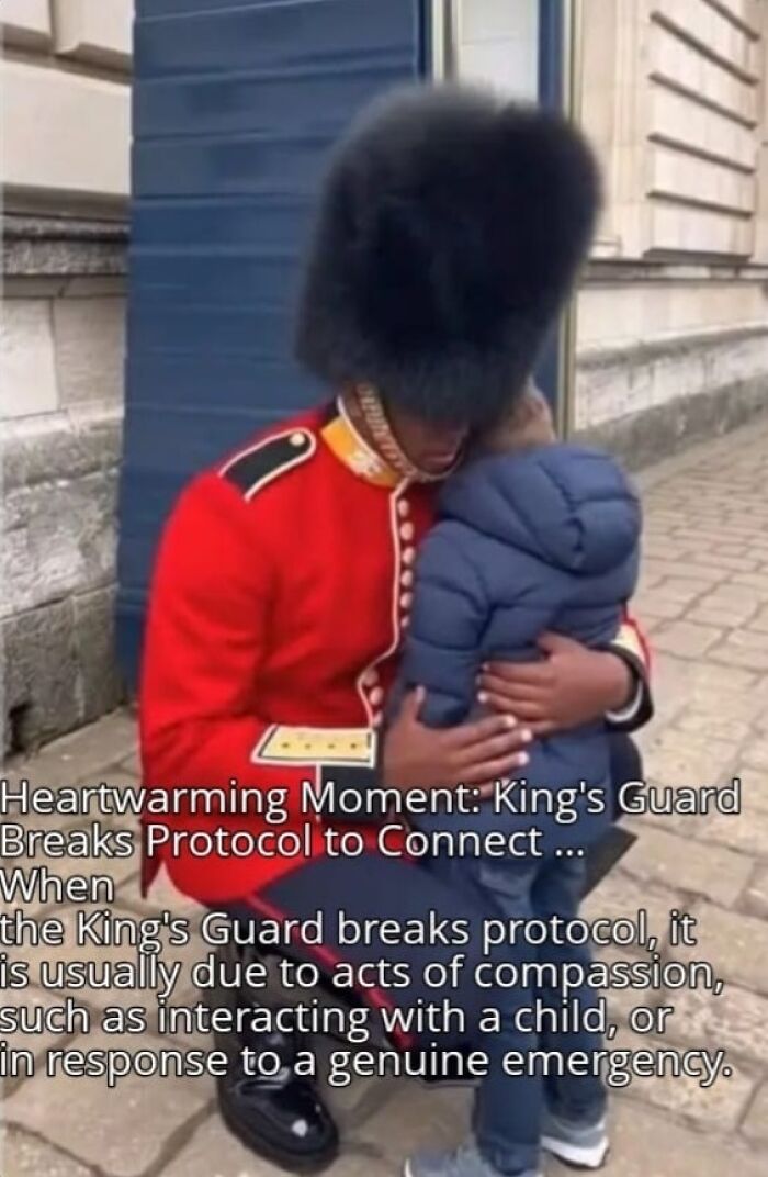 King's Guard in traditional uniform kneeling and hugging a child, showing a rare compassionate moment in a strange world.