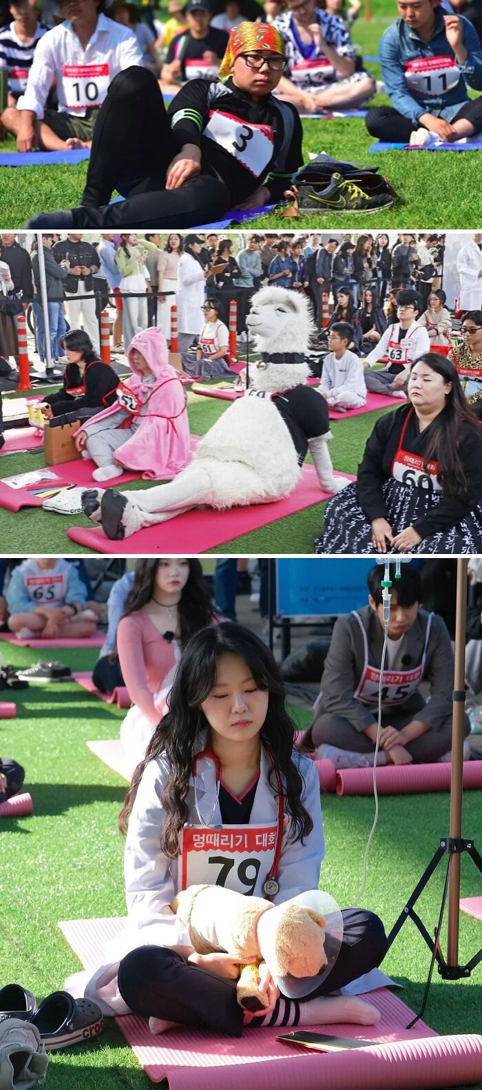 Participants relaxing on grass mats during a unique outdoor event, showcasing diverse costumes and calm moments.