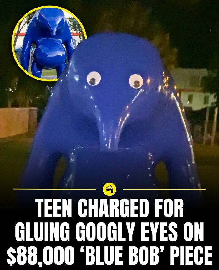 Blue Bob sculpture with googly eyes glued on, featured in spill now photos highlighting unusual world facts.