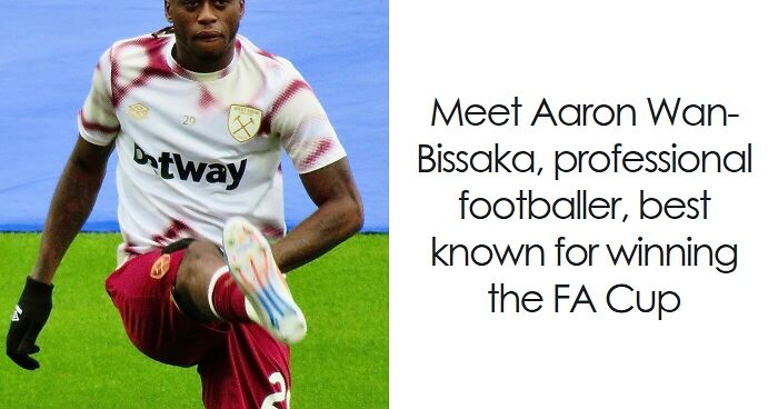Aaron Wan-Bissaka warming up in West Ham training gear, showcasing his football bio and career highlights.