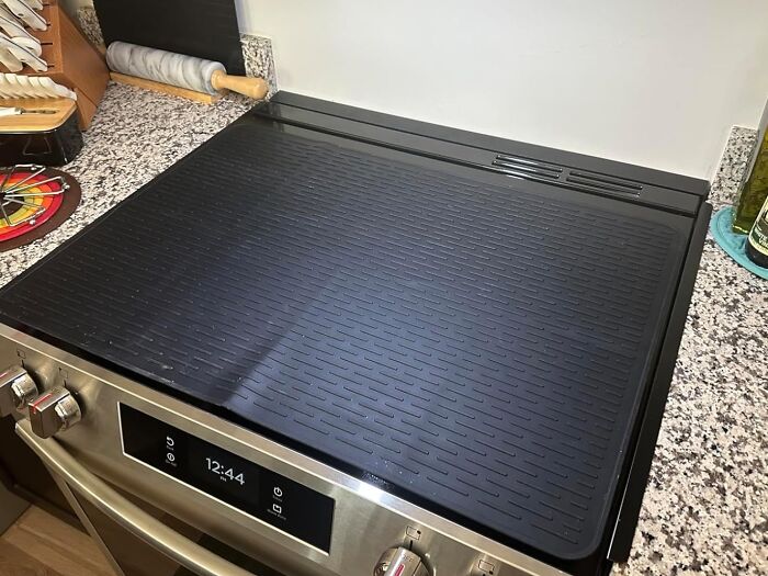  This Stove Top Gap Filler Closes The Official Grand Canyon For Crumbs And Other Kitchen Casualties That Lives Right Next To Your Stove