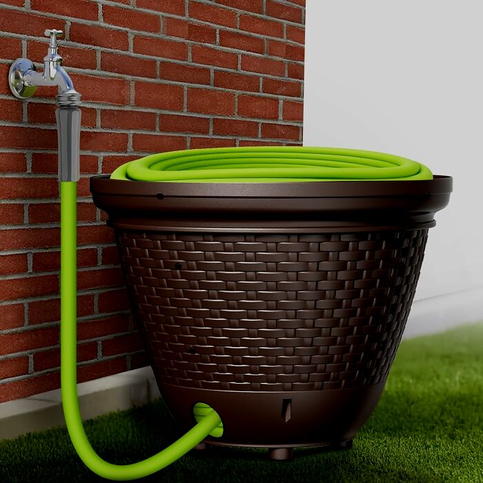 The Great Green Serpent That Has Been Menacing Your Backyard's Aesthetic Can Now Be Charmingly Tamed By This Garden Hose Holder Pot 