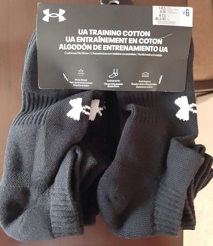 Black Under Armour UA training cotton socks with cushioned support, listed among top Cyber Monday deals this year.