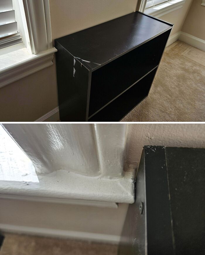 Black shelf perfectly aligned with window trim, demonstrating a rare moment of things aligned so perfectly.