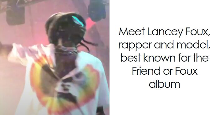 Lancey Foux, rapper and model, performing on stage with colorful lights and wearing a vibrant tie-dye shirt.