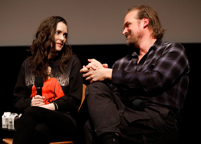 David Harbour and Stranger Things co-star sharing a moment during an interview at a promotional event. David Harbour and Stranger Things co-star sharing a moment during an interview at a promotional event.