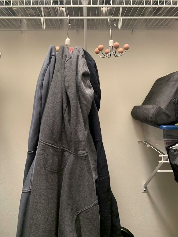 The One Chair In Your Bedroom That's Actually Just A Pile Of Sweatshirts Is About To Get Its Job Back Thanks To A 360-Swivel Hoodie Hanger 