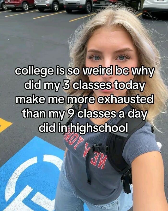 Young woman taking a selfie in a parking lot with a backpack and a funny educational meme about college exhaustion.