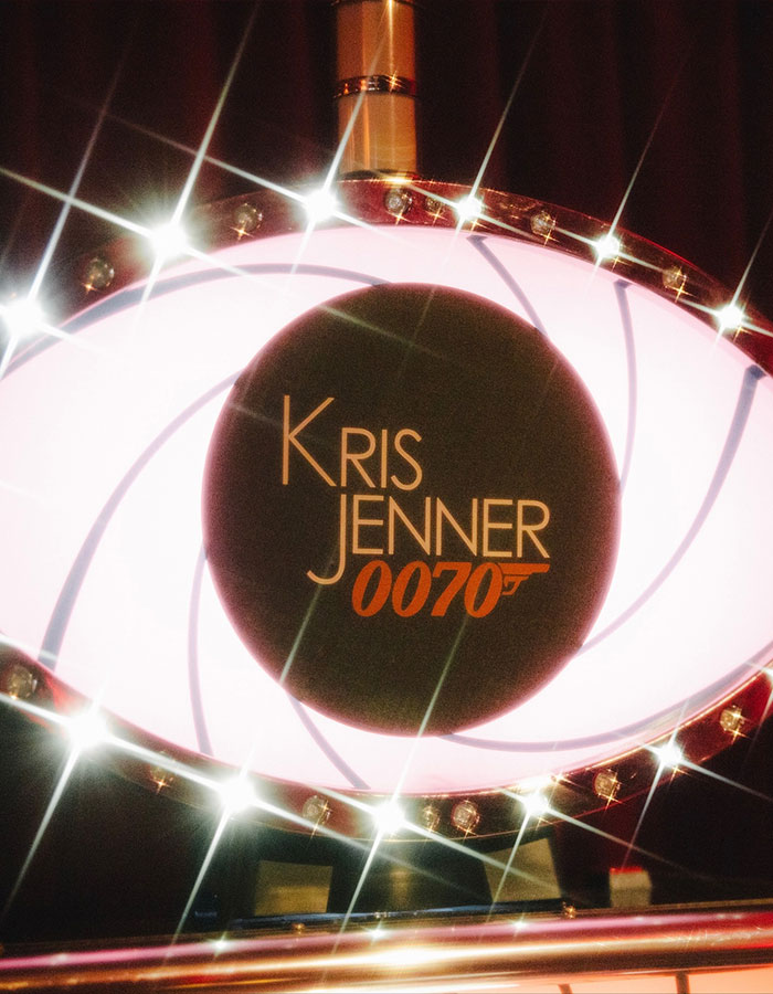 Illuminated Kris Jenner 0070 sign with sparkling lights at her 70th birthday bash guest list event. Illuminated Kris Jenner 0070 sign with sparkling lights at her 70th birthday bash guest list event.