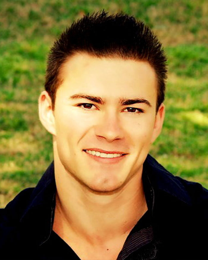 Young man smiling outdoors with text about mom claiming she discovered her son's skinned body on display in Las Vegas museum. Young man smiling outdoors with text about mom claiming she discovered her son's skinned body on display in Las Vegas museum.