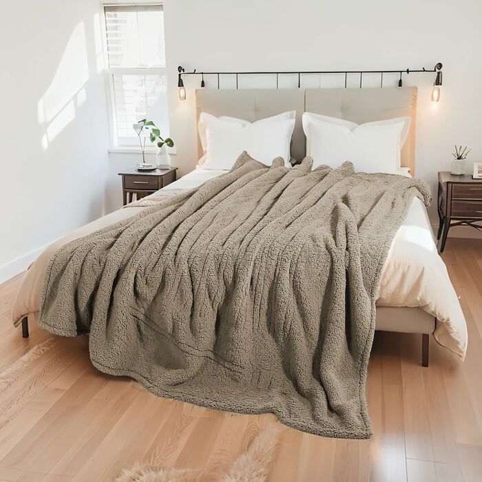 Your Couch Is About To Become A Dangerously Cozy Hibernation Pod From Which You May Never Want To Emerge, All Thanks To An Electric Plush Blanket 