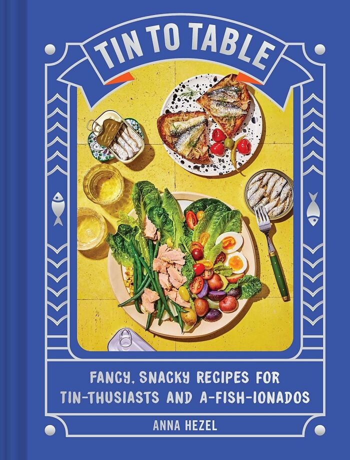 Book cover titled Tin to Table with a colorful plate of fish and salad representing gifts to give satisfaction before holiday shopping.