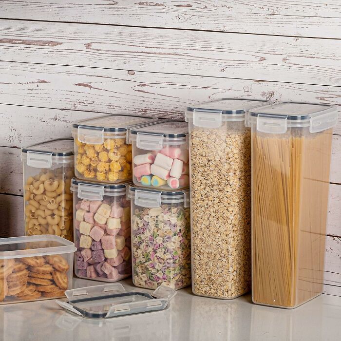 Set of airtight containers storing pasta, popcorn, marshmallows, oats, and snacks, popular viral products on TikTok.