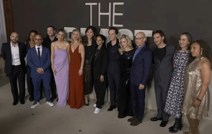 Cast members posing together at a premiere event with Claire Danes featured, highlighting her quivering chin in the new hit show. Cast members posing together at a premiere event with Claire Danes featured, highlighting her quivering chin in the new hit show.