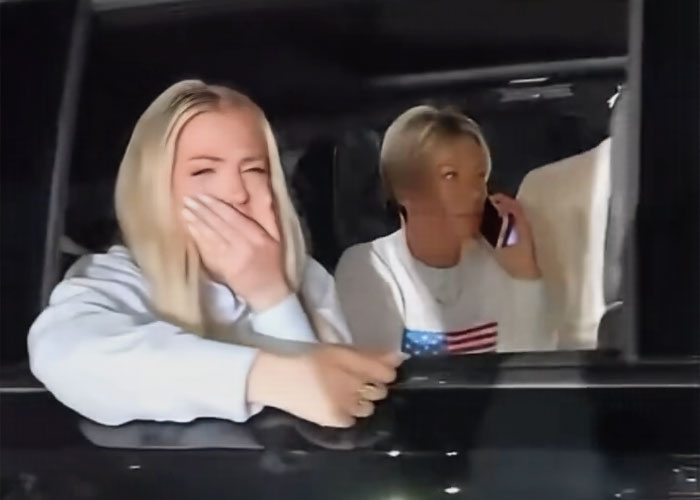Erika Kirk displaying dramatic gestures while crying inside a car, sparking wild conspiracy theories about her acting style.
