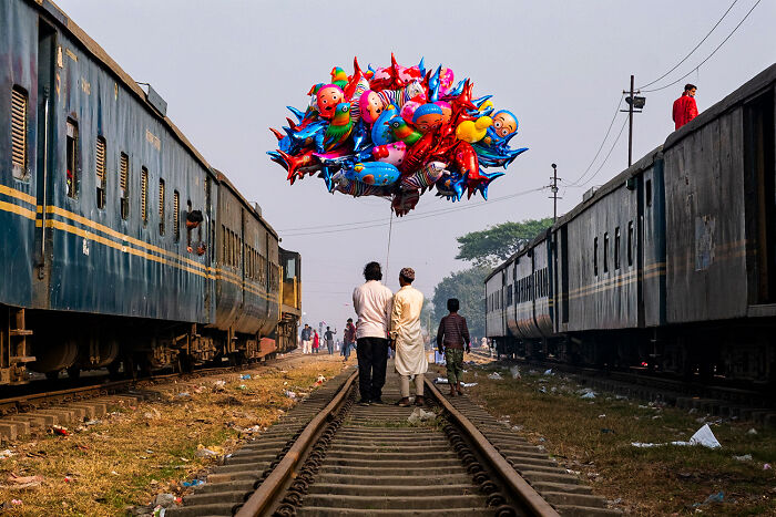 Balloon Vendor From The Series 'Riding The Pilgrims’ Rails' By France Leclerc