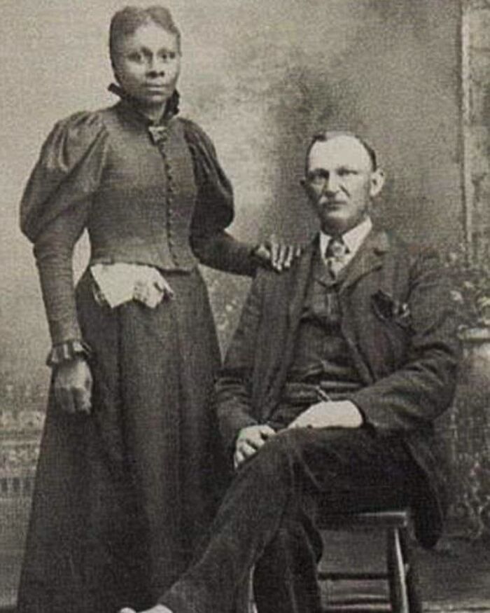 Victorian era couple posing for a formal portrait, showcasing period clothing and style from the weird photos collection.