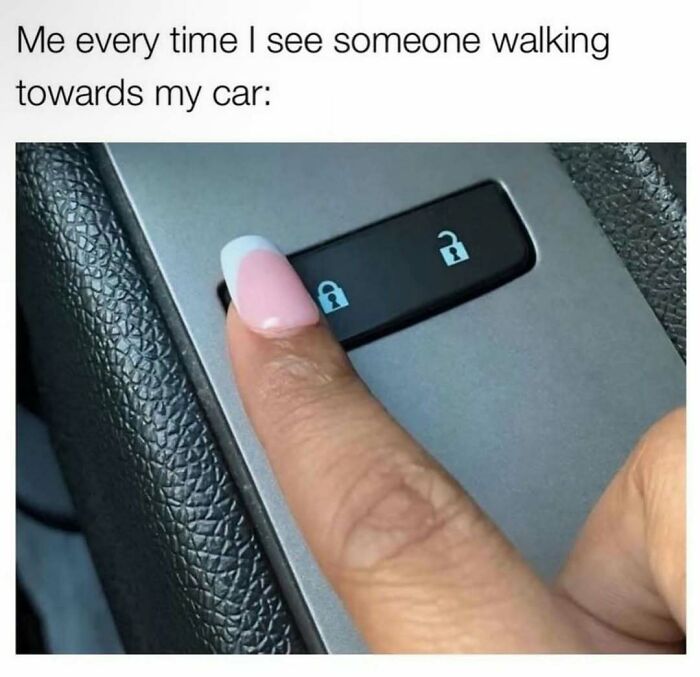 Finger with long pink manicure pressing car lock button, relatable meme about makeup, fashion, and the diva life lifestyle.