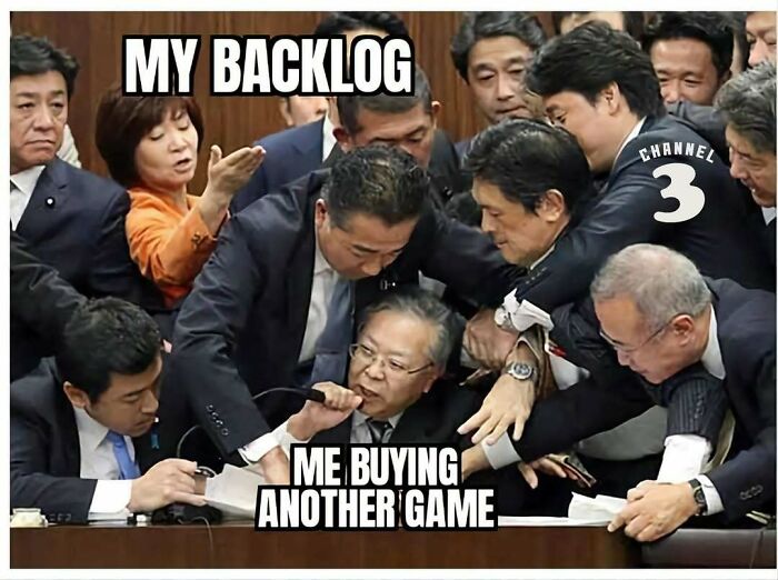 Group of men in suits struggling around a seated man, illustrating funny memes for dads who just want to game in peace.