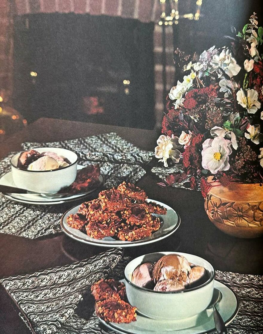 Vintage recipes featured with bowls of ice cream, pecan cookies, and a floral centerpiece on a dark wooden table.