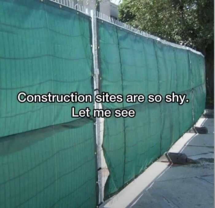 Humorous meme about shy construction sites with green mesh fencing and a playful caption for laughgorithm memes.
