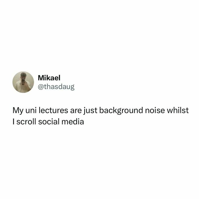 Tweet by Mikael about uni lectures being just background noise while scrolling social media, relatable student memes theme.
