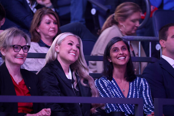 Erika Kirk smiling at TPUSA event during emotional exchange with JD Vance as revealed by lip reader. Erika Kirk smiling at TPUSA event during emotional exchange with JD Vance as revealed by lip reader.