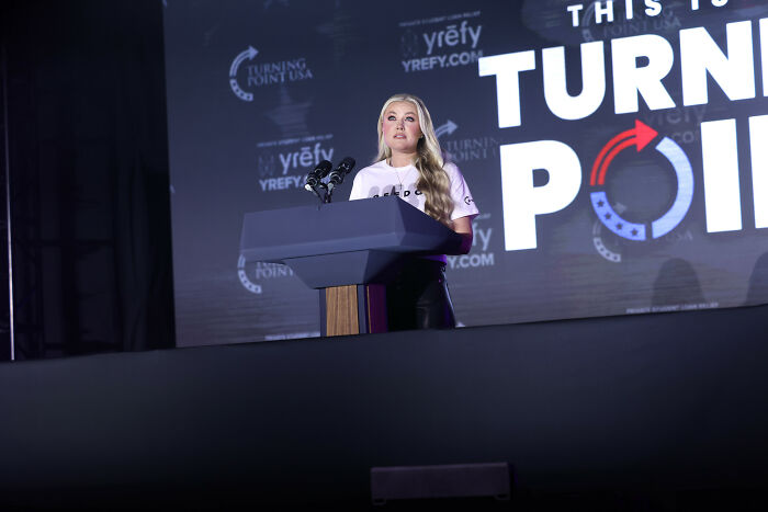 Erika Kirk speaking at Turning Point USA event, sharing emotional exchange with JD Vance as lip reader reveals details. Erika Kirk speaking at Turning Point USA event, sharing emotional exchange with JD Vance as lip reader reveals details.