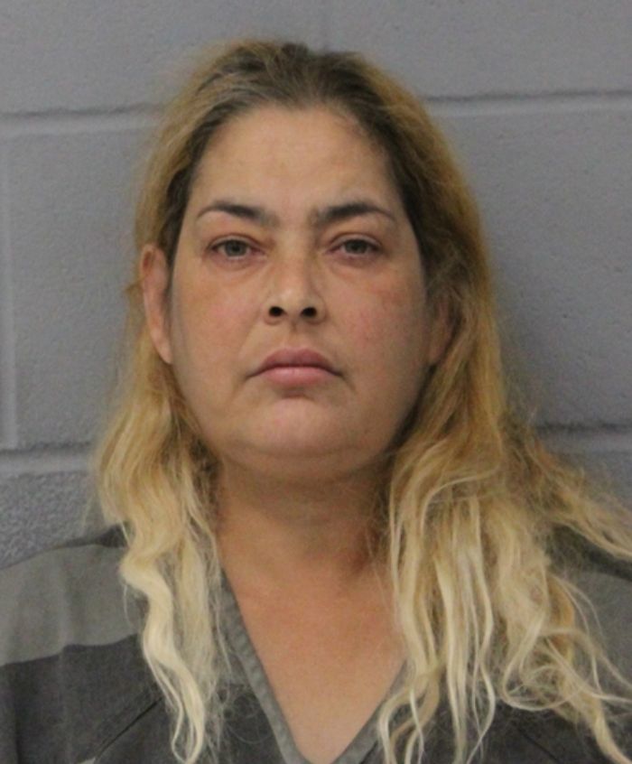 Mugshot of a woman involved in a bizarre case after being found chained in backyard for months. Mugshot of a woman involved in a bizarre case after being found chained in backyard for months.