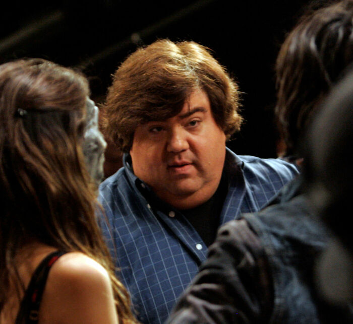 Man with brown hair wearing a blue shirt in conversation, related to Amanda Bynes breaking silence after viral claim. Man with brown hair wearing a blue shirt in conversation, related to Amanda Bynes breaking silence after viral claim.