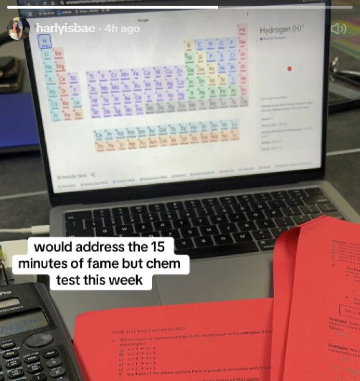 Laptop displaying periodic table with study materials and calculator, highlighting a stunning woman going viral at Georgia-Texas game. Laptop displaying periodic table with study materials and calculator, highlighting a stunning woman going viral at Georgia-Texas game.