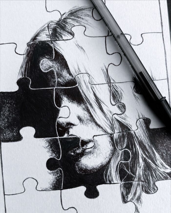 Black and white pencil drawing of a woman's face on a jigsaw puzzle, showcasing creepy yet gorgeous art style.