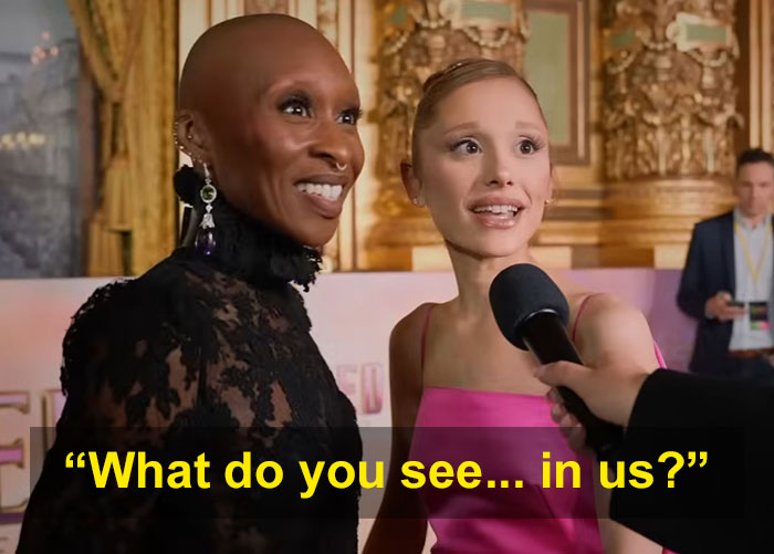 Cynthia Erivo and Ariana Grande at an event, engaging in a new bizarre interaction during an interview. Cynthia Erivo and Ariana Grande at an event, engaging in a new bizarre interaction during an interview.