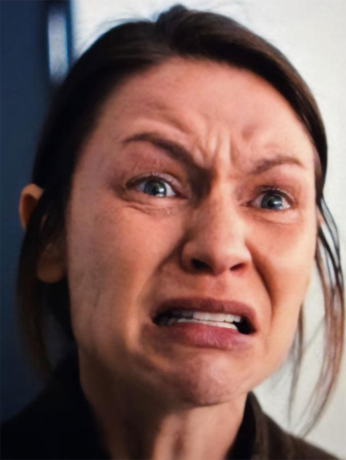 Claire Danes in a close-up showing a quivering chin and distressed expression in a scene from her new hit show. Claire Danes in a close-up showing a quivering chin and distressed expression in a scene from her new hit show.