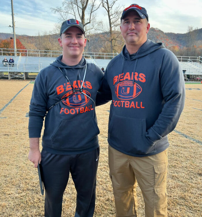 Two men wearing Bears football hoodies stand on a field, highlighting the missing football coach case mystery. Two men wearing Bears football hoodies stand on a field, highlighting the missing football coach case mystery.