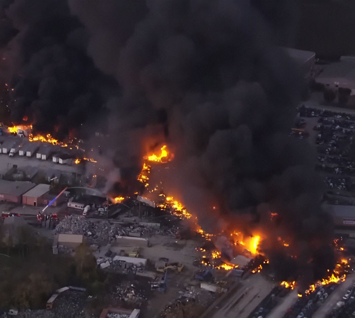 Thick black smoke and fire rising from the wreckage of a UPS plane crash with multiple casualties reported. Thick black smoke and fire rising from the wreckage of a UPS plane crash with multiple casualties reported.