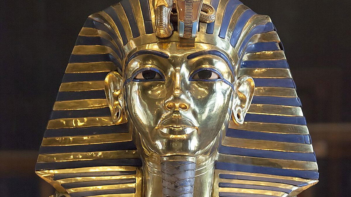 Golden funerary mask of an ancient Egyptian pharaoh with traditional headdress, symbolizing Ancient Egypt memes.