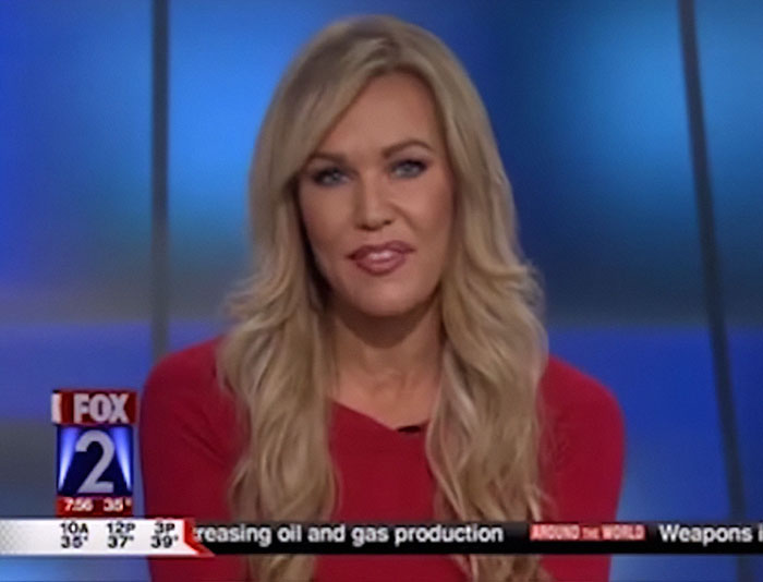 Former news anchor with long blonde hair wearing red, presenting on a Fox 2 news broadcast about a Halloween incident. Former news anchor with long blonde hair wearing red, presenting on a Fox 2 news broadcast about a Halloween incident.