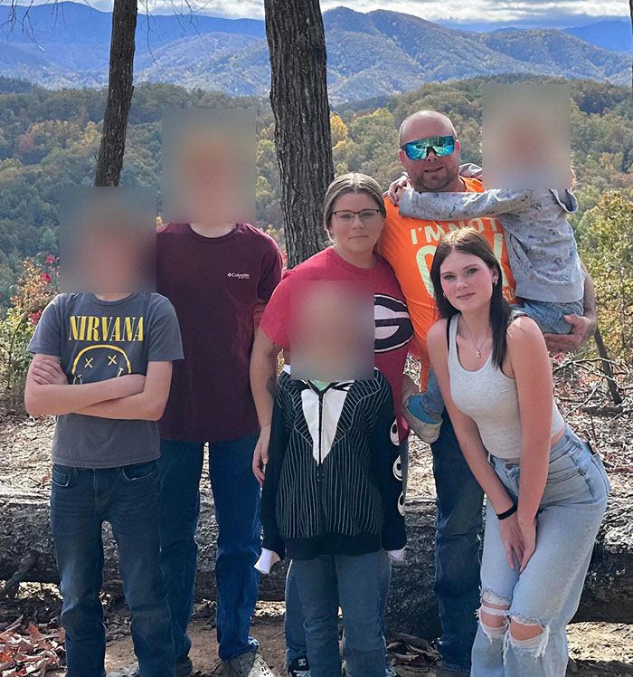 Family group photo outdoors with blurred faces, stepsibling under investigation after teen's body found on Carnival Cruise Family group photo outdoors with blurred faces, stepsibling under investigation after teen's body found on Carnival Cruise