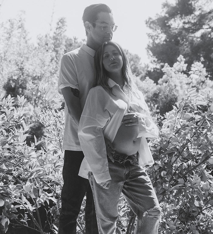 Ashley Tisdale makes name change official, posing outdoors with partner in a serene, nature-filled setting. Ashley Tisdale makes name change official, posing outdoors with partner in a serene, nature-filled setting.