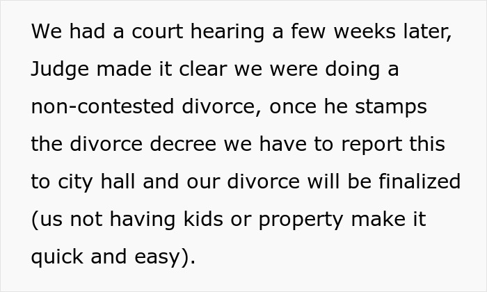 Man happy after ex-wife caught cheating, smiling and relieved during court hearing for divorce finalization.